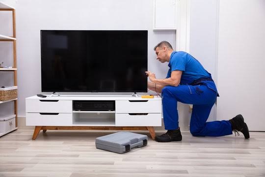 Smart TV displaying Wi-Fi network settings in a living room